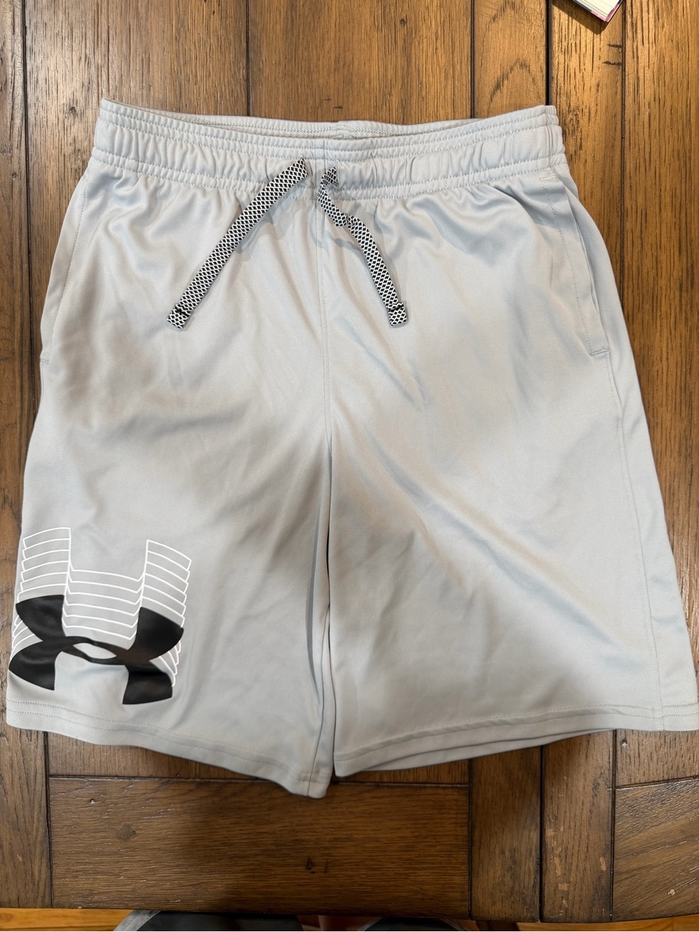 Under Armour Men's Light Gray Athletic Shorts with Black Logo